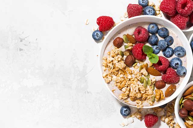 muesli with yogurt and berries for breakfast